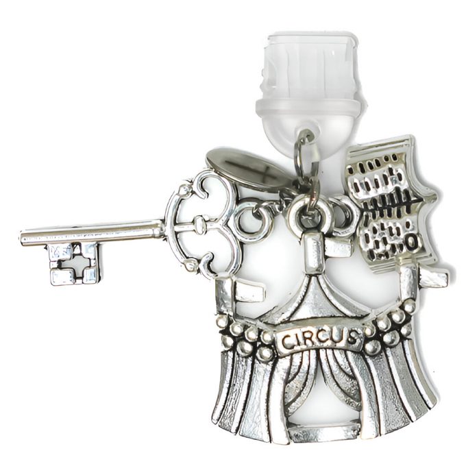 Circus DustCharm Caraval featuring a circus tent, key, and book pendants in silver