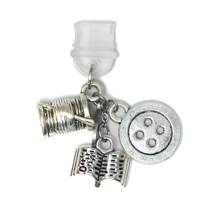 Adena DustCharm featuring silver spool, needle, button, and book inspired by Powerless