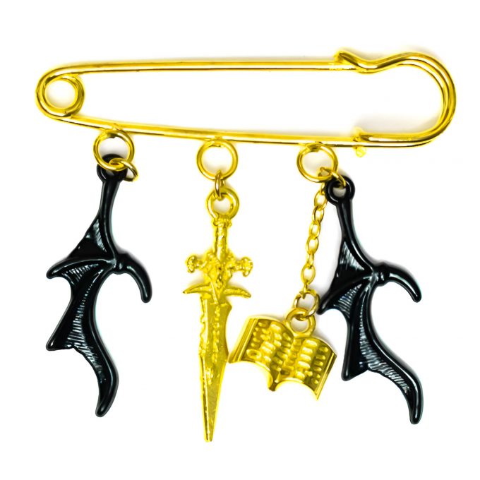 Golden snapcharms inspired by acotar bat boys with Truthteller dagger, bat wings and a book