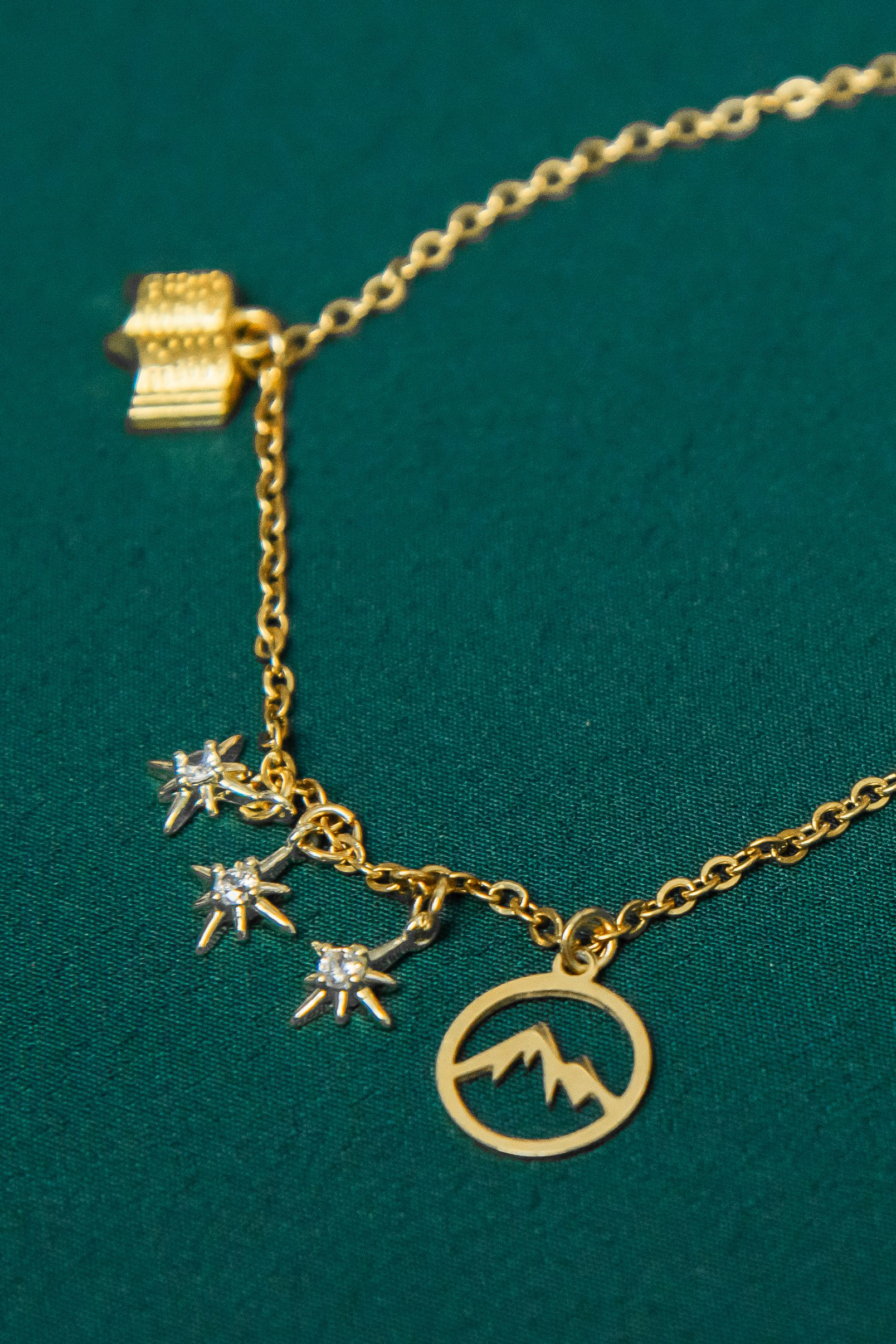 About althemi - Handcrafted book-inspired jewelry displayed on a minimal, elegant background.