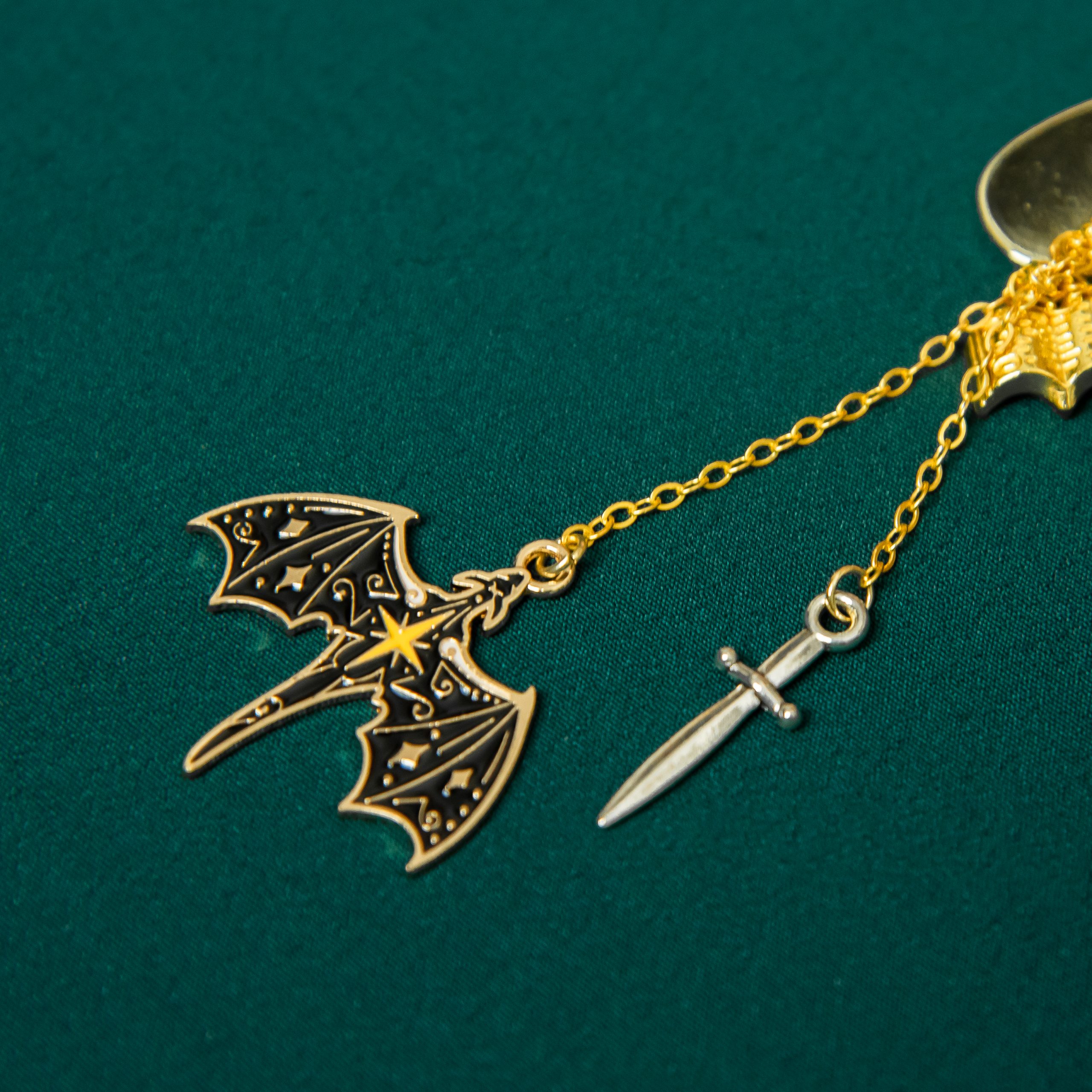 Adhesive StickyCharm for clothing, phones, and accessories.