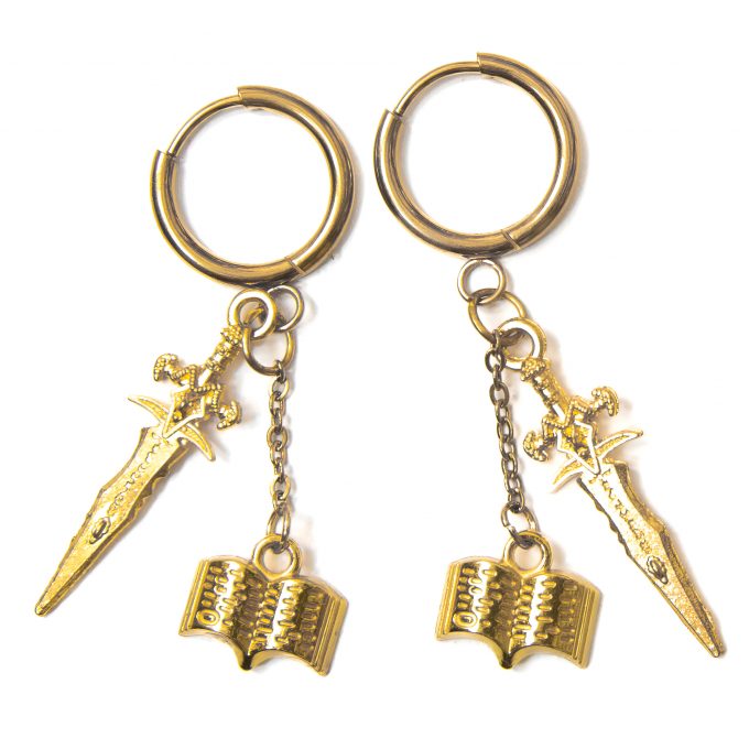 Golden dagger and books