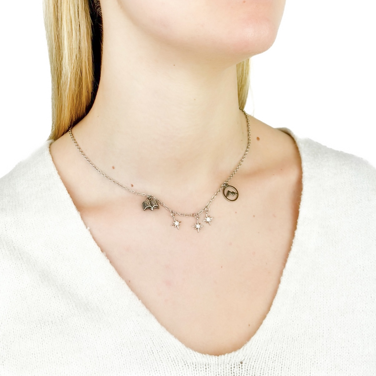 Silner necklace with mountain, stars and book charms